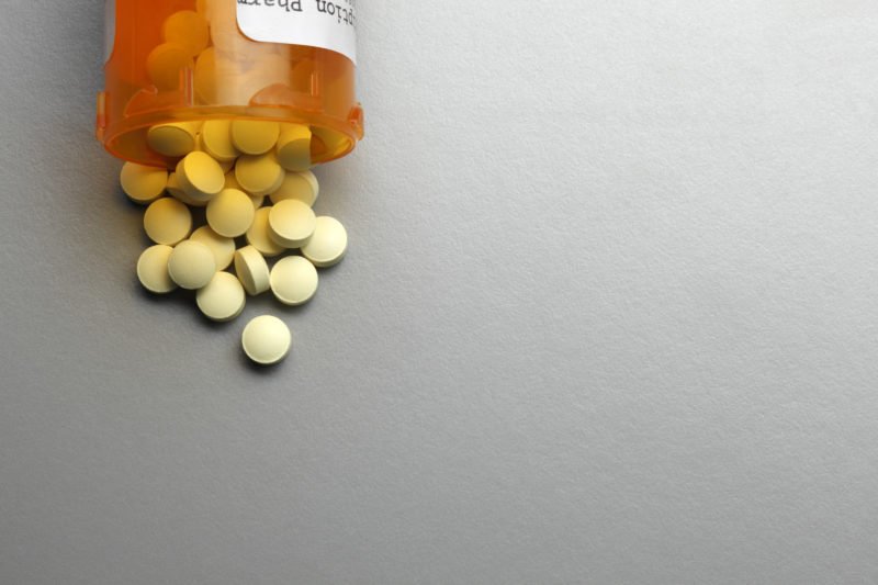 open bottle of defective prescription drugs