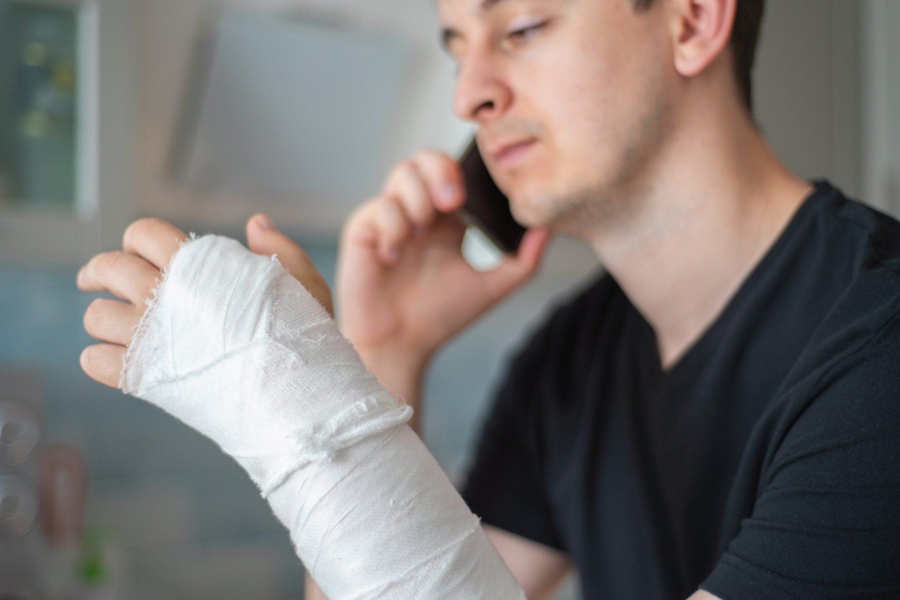 A man with a broken arm after suffering a personal injury.