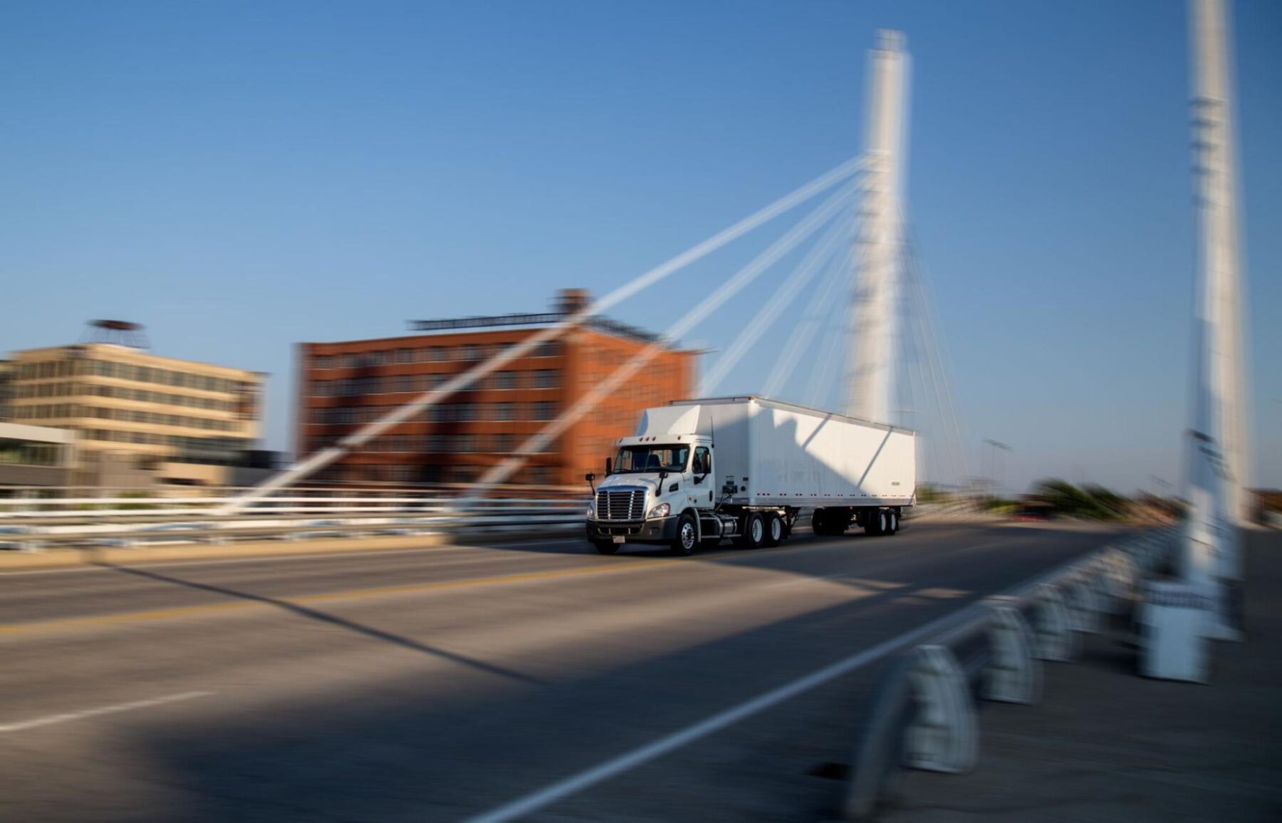 A commercial truck passes over a bridge in Milwaukee, Wisconsin.